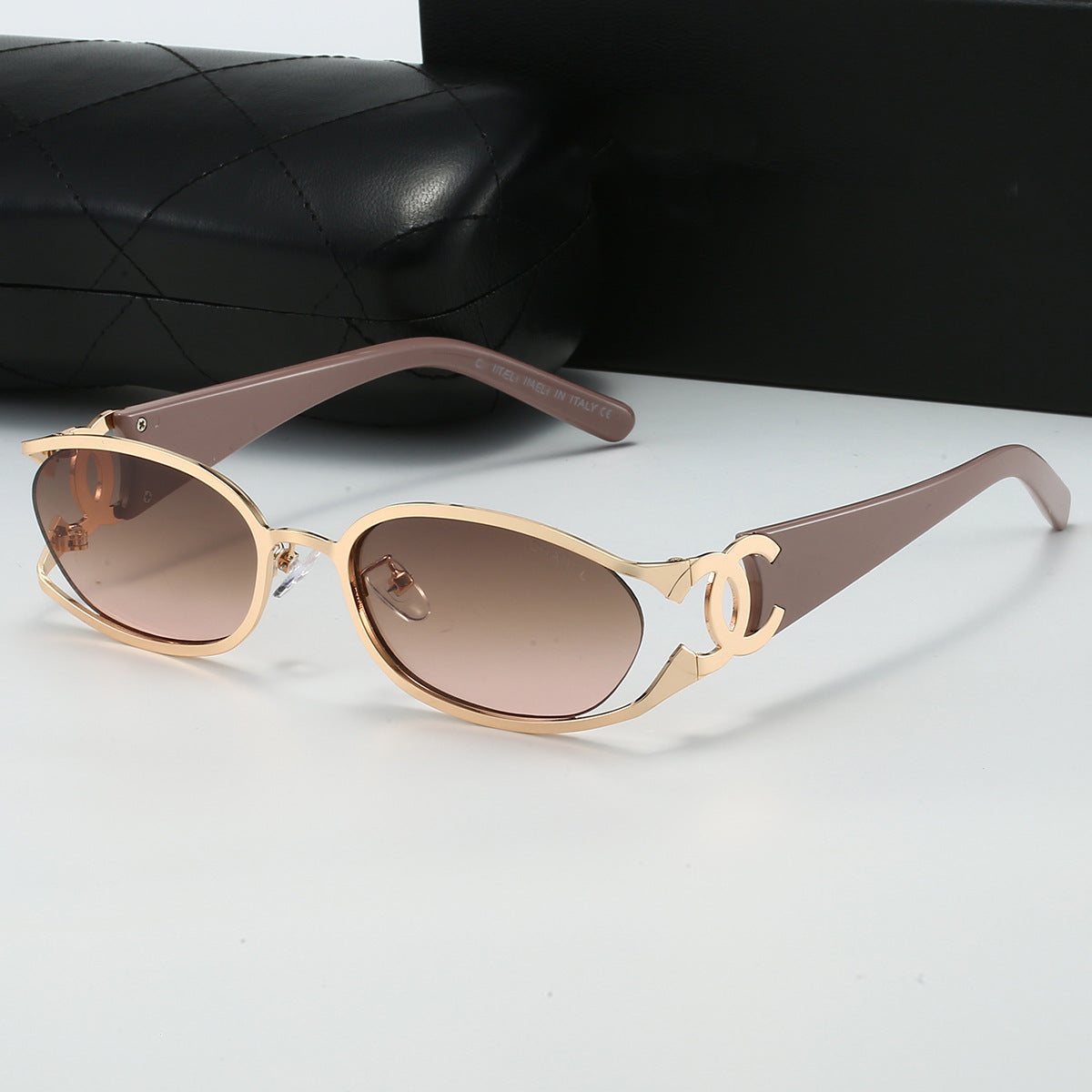 Chanel Style Double C Letter Sunglasses Metal Frame gold Hollow Temple Sunglasses for Women Oval Vintage Style Fashionable