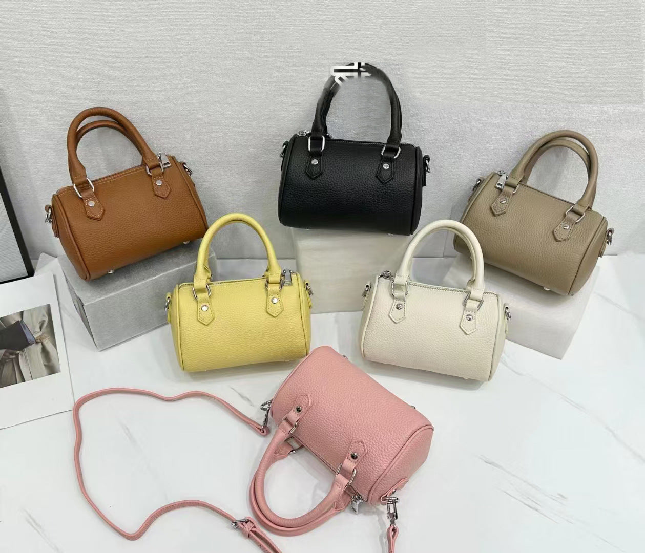 Guangzhou High-Quality Texture Genuine Leather Boston Pillow Bag for Women2024New first-layer cowhide handbag and crossbody bag