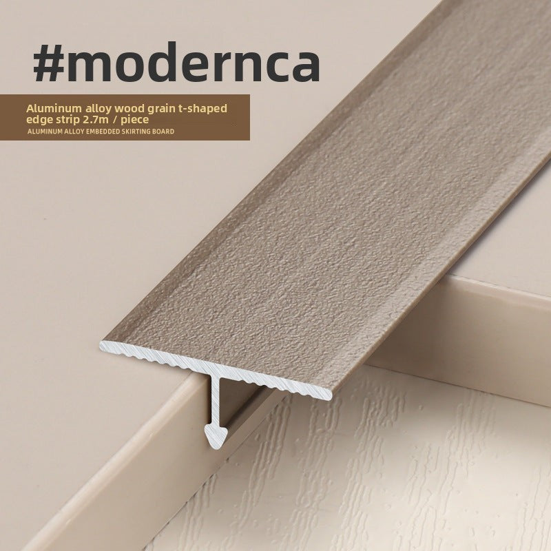 Modernca aluminum alloy wood grain T-shaped edge strip in light brown color.