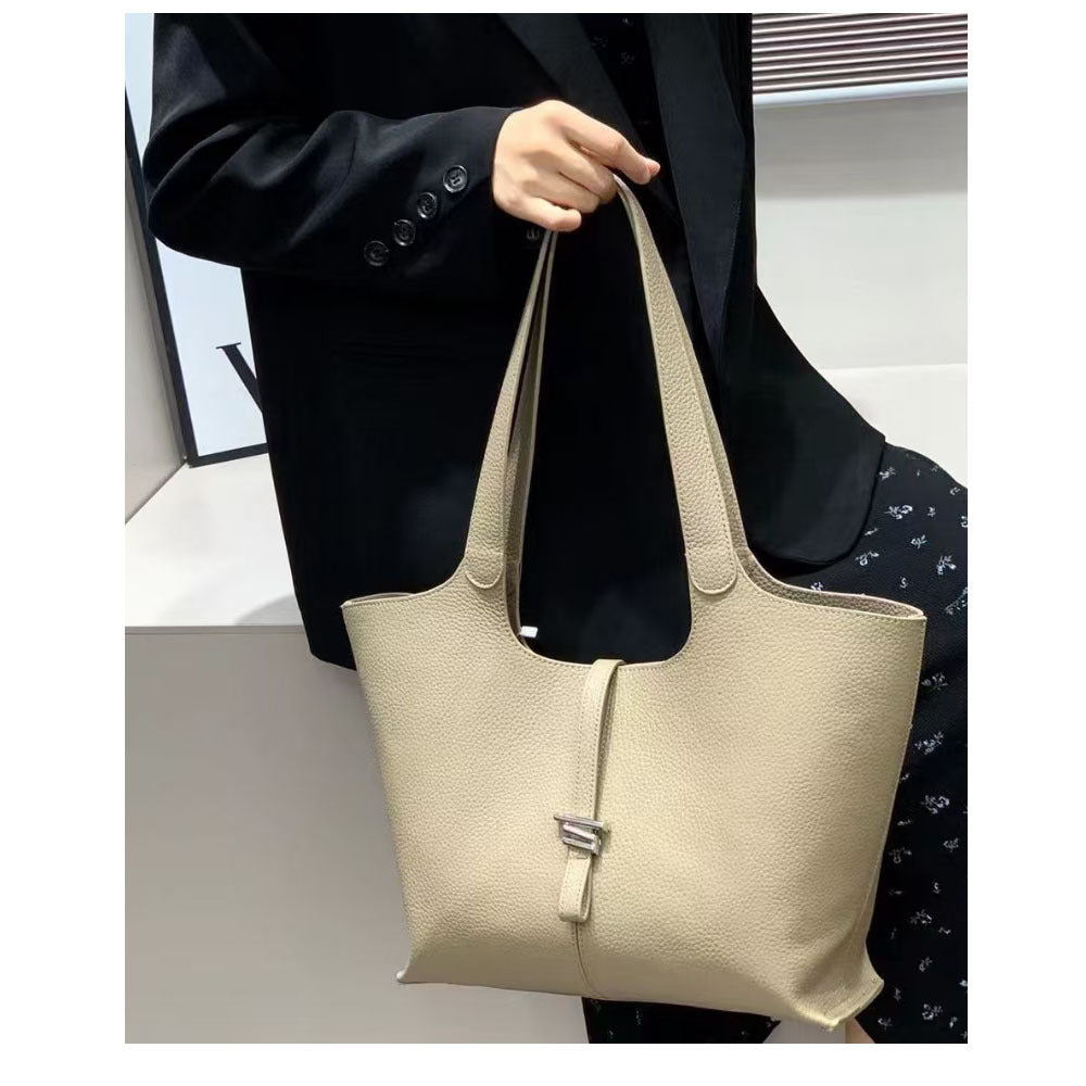 Wind Chime Tote Bag2025New Top Layer Cowhide High-End Large Capacity Niche Design Commuter Shoulder Underarm Bag
