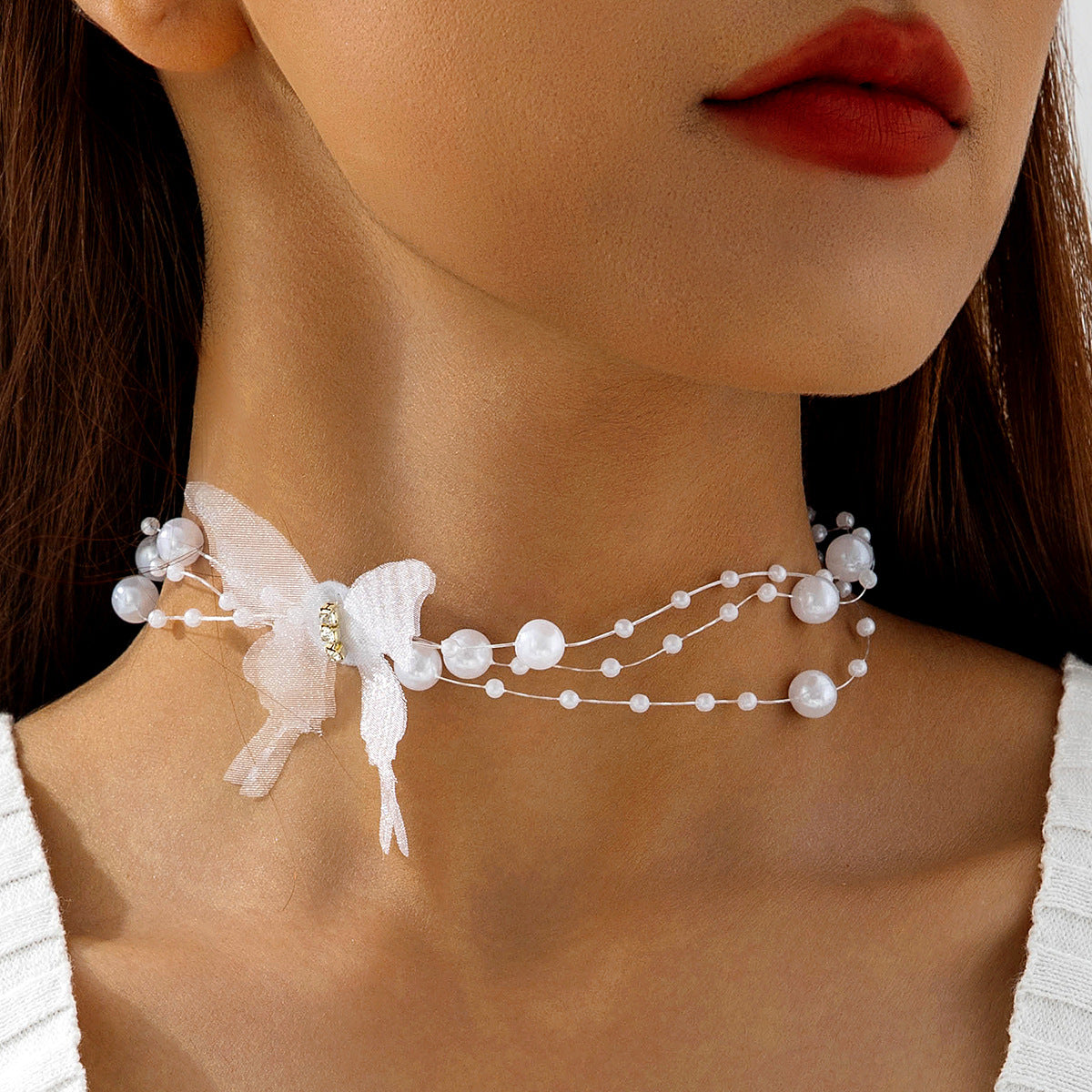 European and American Ornament Fashionable Light Luxury Butterfly Pearl Necklace Niche High-End Collarbone Chain Beaded Necklace Wholesale