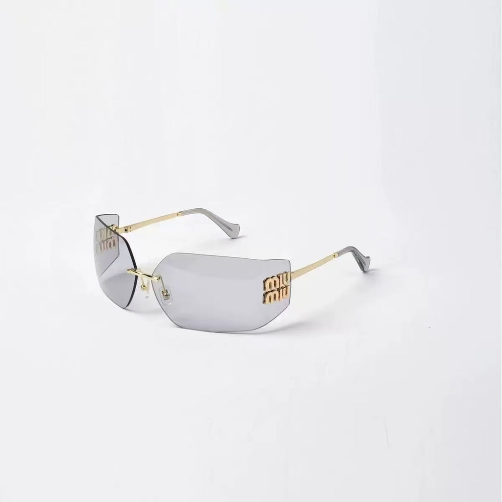 2014High Version Xiaohongshu Same Style Sunglasses for Women UV Protection Miu Miu New Frameless Sunglasses mu54y