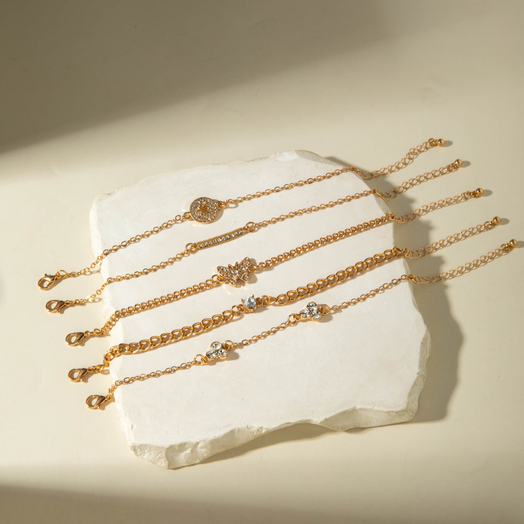 European and American Light Luxury Accessories Heart-shaped Leaf Inlaid Diamond Four-layer Bracelet Butterfly Knot Open Bracelet Set for Women