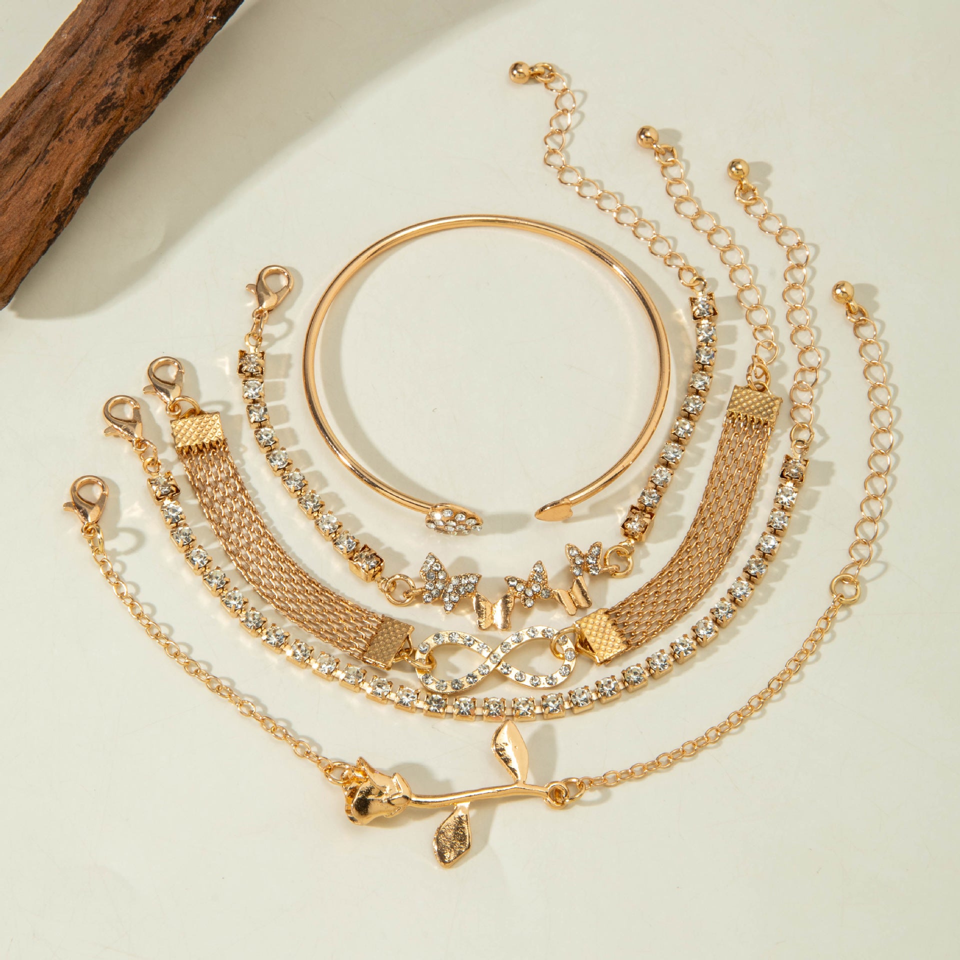 European and American Light Luxury Accessories Heart-shaped Leaf Inlaid Diamond Four-layer Bracelet Butterfly Knot Open Bracelet Set for Women